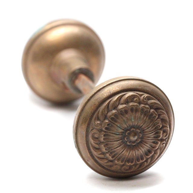 This Romanesque style radial door knob is made by Lockwood in the 1900 catalog. It is part of the L-11300 Stanwich group....