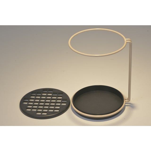 Postmodern umbrella stand by Magis, designed by Boccato, Gigante, and Zambusi Architetti. The striking contrast of black...