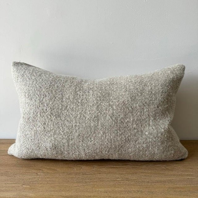 A soft natural flax oatmeal and beige woven fibers in a stonewash finish create this luxurious soft pillow. Sewn with an...