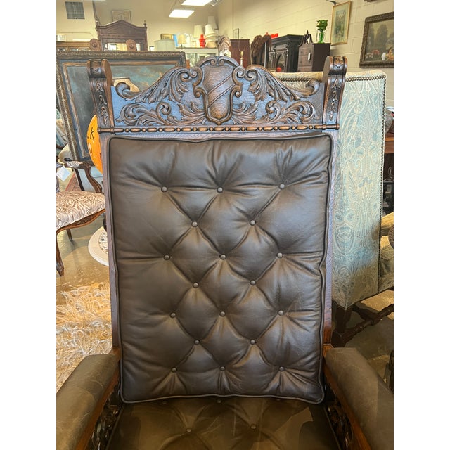 Stunning throne chair featuring ornate carvings, high-back and new leather upholstery. Made of quarter-sawn oak. 29"w x...