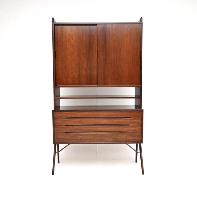 A stunning Danish vintage cabinet by Kurt Ostervig. This was made in Denmark, it dates from the 1960’s. The quality is...