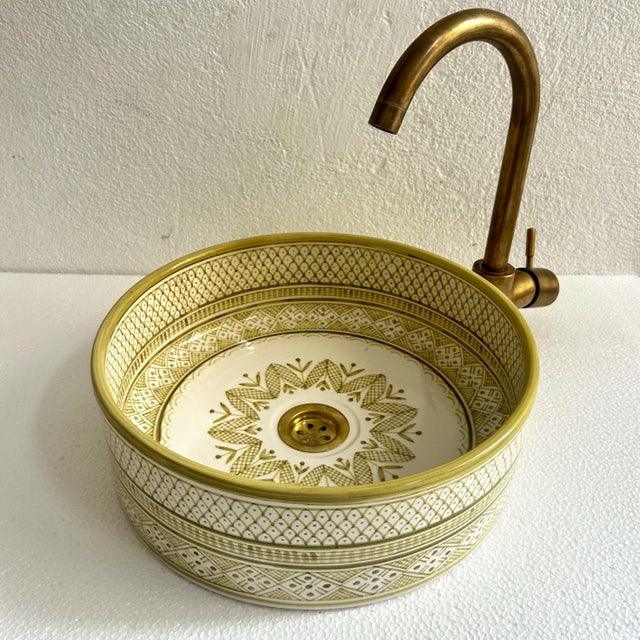 Add a Touch of Timeless Beauty to Your Bathroom with Our Handcrafted Light Green Sink Experience elegance in your bathroom...