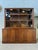 Original display cabinet. Oak. Art Deco period. Rounded doors. Remarkable brass key and ball hinges. 2 sliding glass...