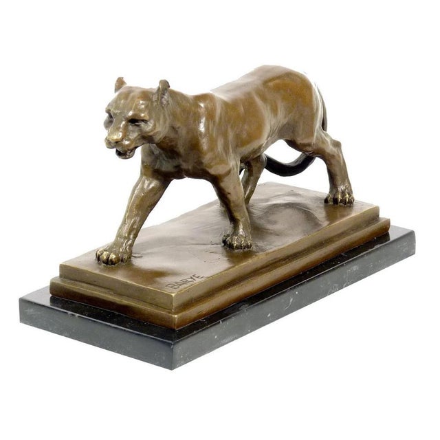 Art Deco style brown patinated bronze panther sculpture from the 20th century. This animal bronze sculpture represents a...