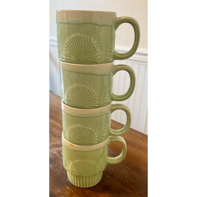 This is a set of four distinctive jadeite style green mugs designed for their efficient stacking ability. They perfectly...