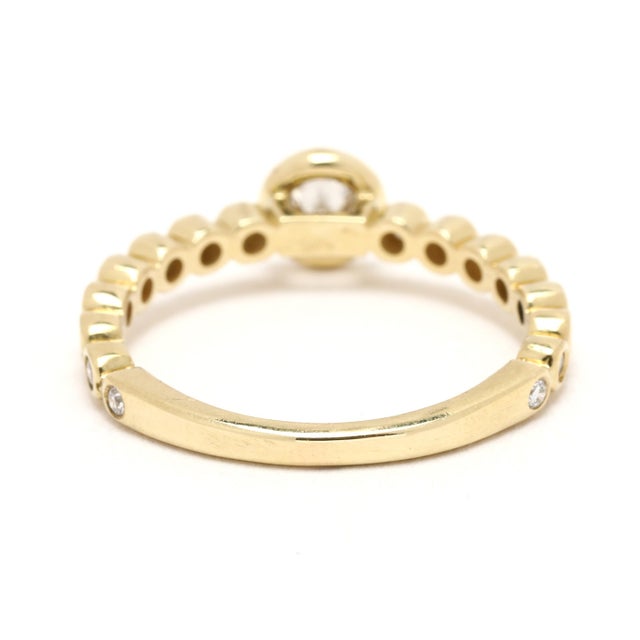 Stones: diamonds, 17 stones round brilliant cut 1.3 - 3.5 mm approximately .33 total carats F-G color, VS1-2 clarity Ring...