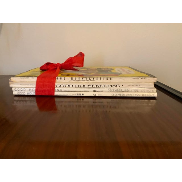 A charming collection of four vintage, good housekeeping Christmas magazines spanning over two decades of mid-century...