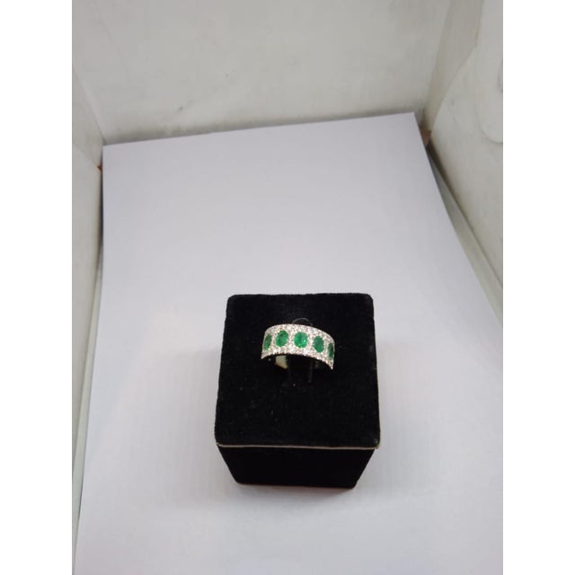 Gemstone details Gold Purity: 18K Solid Gold Emerald: 1.75 cts Diamond: 1.06 cts 18K gold Net weight: 5.78 grams Gross...
