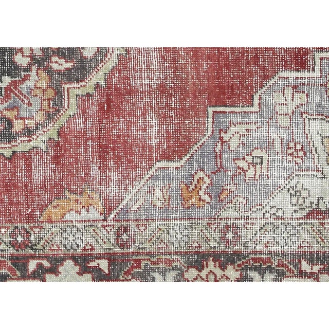 1960s Turkish Oushak Rug. Handwoven with wool on wool foundation in the Oushak region of Western Turkey. The Anatolian...