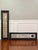 Coordinating pair of painted wooden Nantucket wall signs. Acquired on Nantucket, they feature a shutter style form with a...