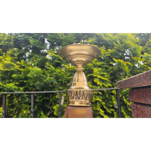 Art deco, brass ceiling lamp, dimensions: height: 37 cm, diameter: 14.5 cm. European Plug (up to 250V).The wiring of this...