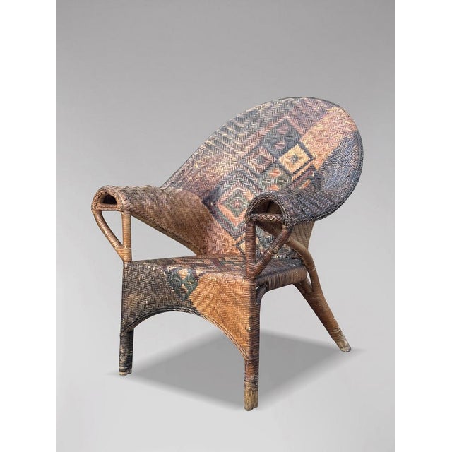 Very Decorative Early 20th-Century Arts & Crafts Wicker Rattan Armchair by Dryad & Co A very decorative early 20th-century...