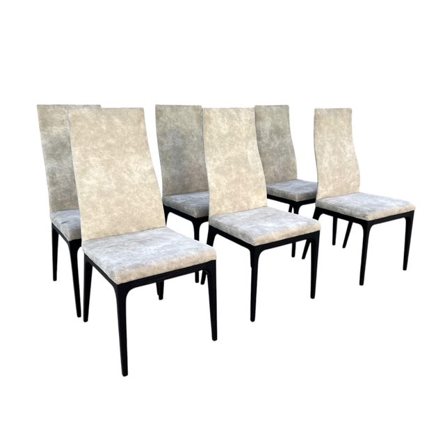 Bring sophisticated style and comfort to your dining space with this stunning set of six high-back dining chairs,...