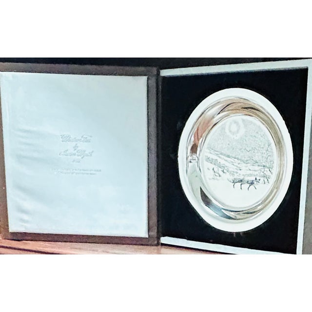 There are no scuffs and scratches on the plate. See pictures for details—features 925 sterling silver. Plate measures 8...