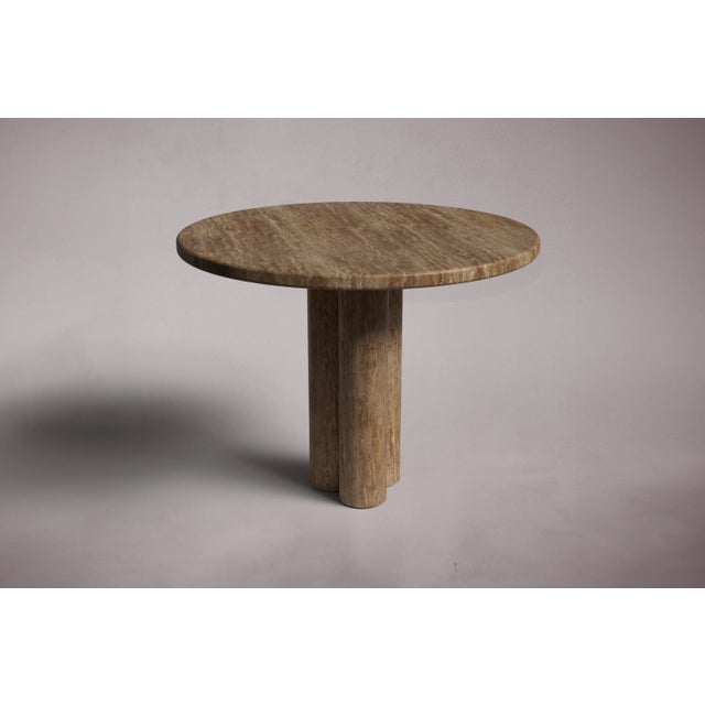 Crafted and hand-finished from Noche Travertine. As a natural material, all stone is porous and susceptible to nicks,...