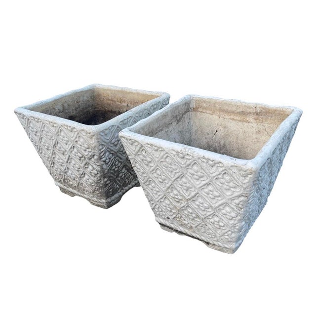 Elevate your garden, patio, or entryway with this striking pair of vintage cast stone planters. Crafted with an eye-...