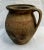 Early 1900s handcrafted Turkish pottery pitcher. Imported from the Netherlands. Hand curated for its charm and artistic...