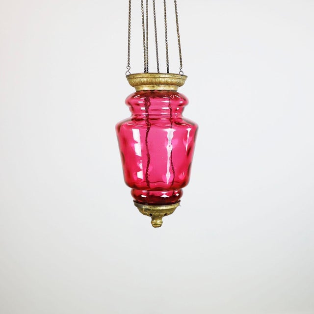 Circa 1920. We offer this beautiful Antique Hanging Candle Lantern. The Lantern includes a beautiful system where the...
