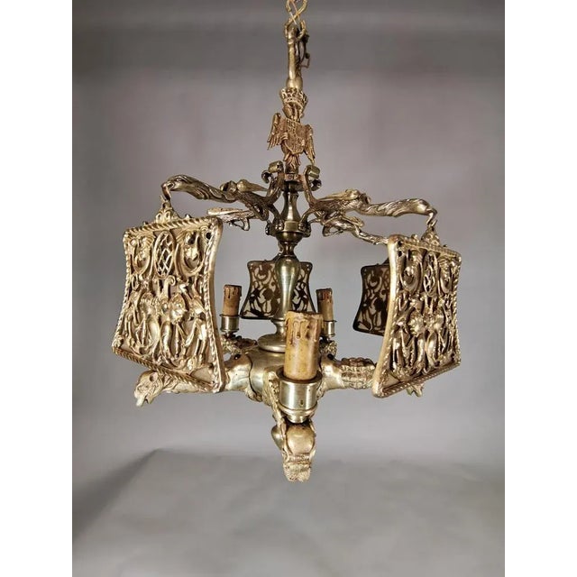 Important gilded bronze lamp of the 19th century Decorated with dragons and crowned with a Nobiliary shield weight 20 kg...
