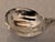 A large, sterling silver serving spoon in the legendary pattern "Francis I" by Reed & Barton. Officially identified by the...