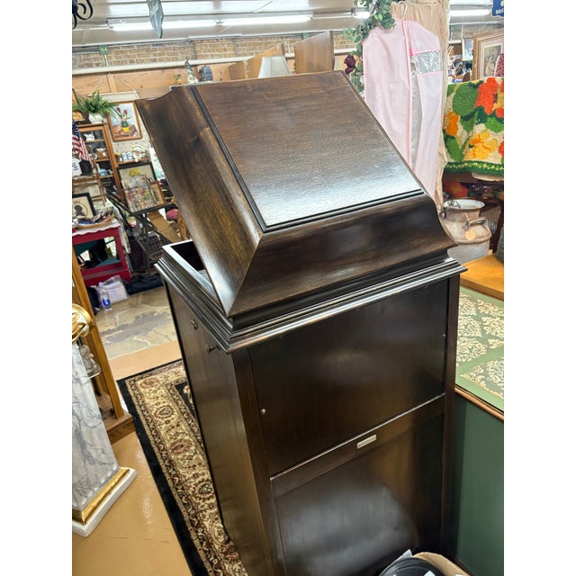 Bring home a remarkable piece of American history with this beautifully restored 1919 Silvertone floor phonograph cabinet....