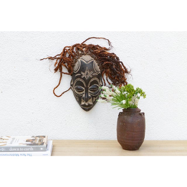 This serene Guro mask from the Ivory Coast is a beautiful example of African tribal art. The mask is characterized by its...