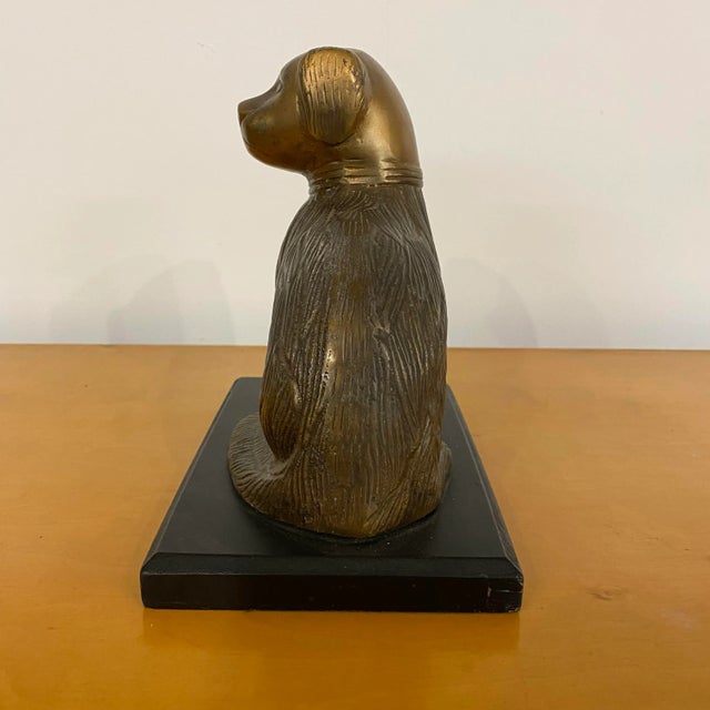 Mid century modern brass figure dog The figure is made of brass and sits on a wooden base The figure is in good vintage...