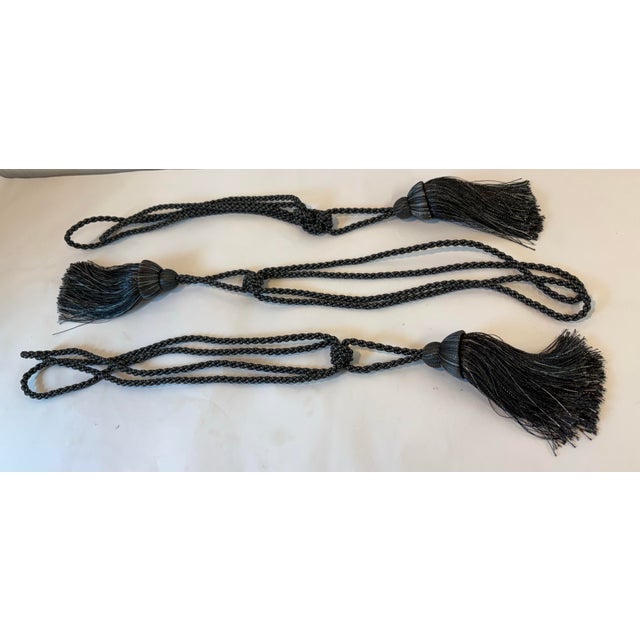 Nice set of three grey and silver tassel tie backs!
