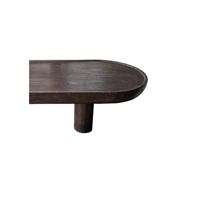 This solid Suar wood table features a beautiful dark brown espresso finish, achieved through a multi-stage burning process...