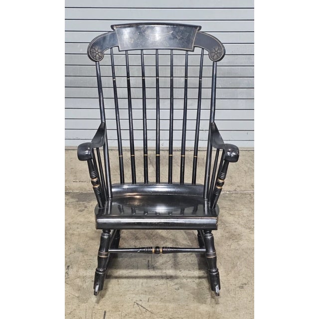 Store Item: Black Hitchcock Style Windsor Arm Rocking Chair Harvest Stencil Gold Accents Description: Chair has fan back...