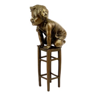 Patinated Bronze Sculpture of Seated Child For Sale