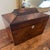 antique wooden box is a 19th-century sarcophagus-form tea caddy, a style popular during the British Regency and early...