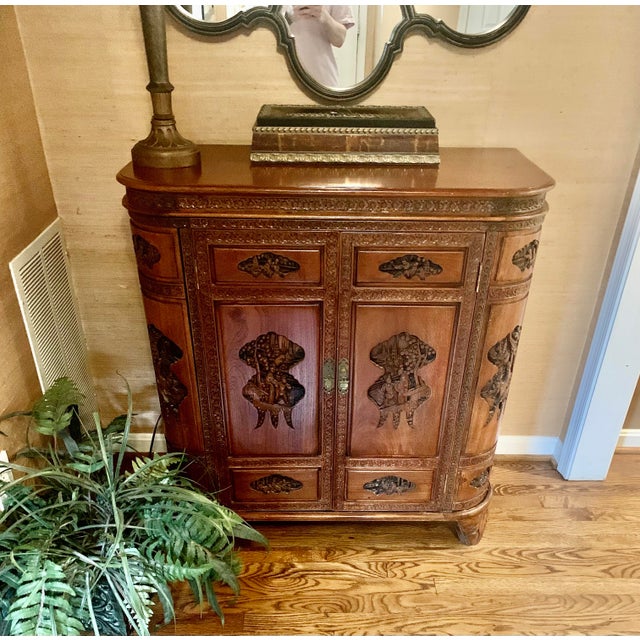 Mid-century Chinese carved solid Rosewood dry bar liquor cabinet. My parents purchased this in the 60s while stationed in...