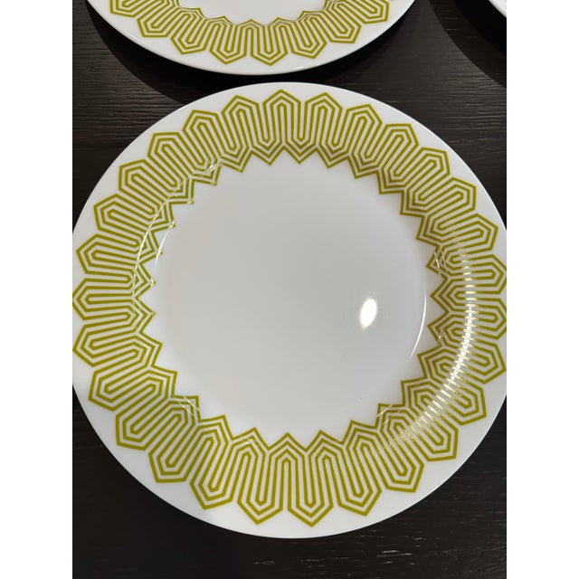 New/never used Happy Chic plates by Jonathan Adler. Set of 8. Chartreuse geometric design on white ceramic. Dishwasher and...