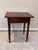 The table is an American Sheraton or Late Federal style single-drawer stand, also commonly called a work table or side...
