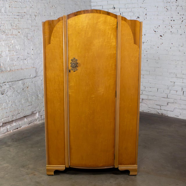 Charming Early to Mid-20th Century Vintage English & Art Deco style smaller wardrobe, armoire, or storage cabinet composed...