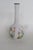 This highly charming Small Bud Vase is made out of ceramic. This beautiful vase has magnificent style; it features an...