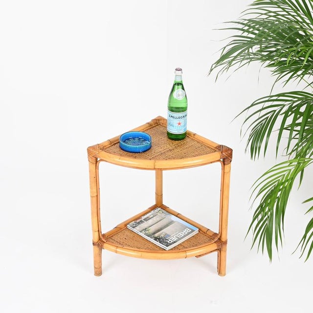 Wonderful pair of French Riviera style nightstands or side tables in bamboo, rattan, and woven wicker. These incredibly...