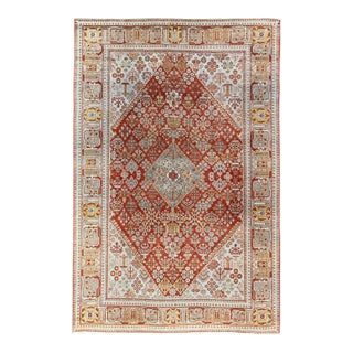 Early 20th Century Antique Persian Joshegan Rug With Geometric Medallion Design in Rust and Ivory For Sale