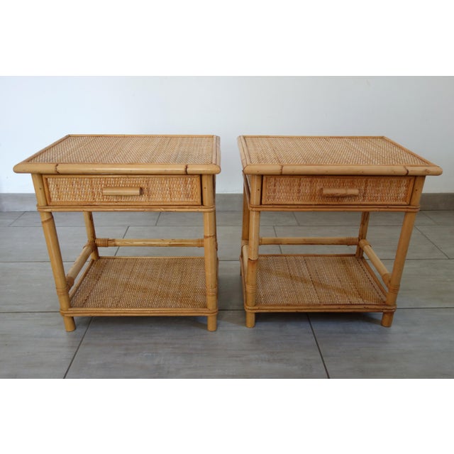 Pair of rattan, bamboo, and wicker bedside tables from the 1970s/80s. Made by a French cabinetmaker, these bedside tables...
