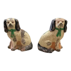 Pair of Mid 20th Century British Colonial Seated Dogs With Green Ties