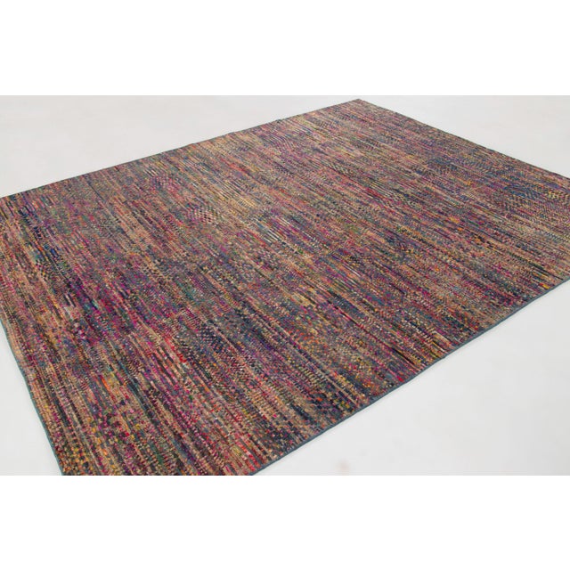 Hand-knotted in wool and natural silk, this 8x10 contemporary rug joins Rug & Kilim’s Modern collection as an inventive...