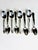 A charming addition to any coffee or tea service, this vintage set of eight Oneida silverplate demitasse spoons showcases...