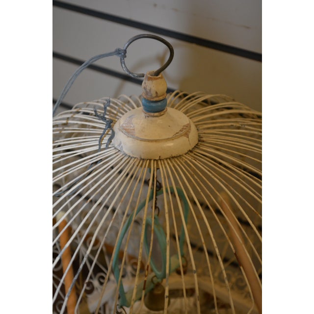 Great vintage birdcage. Wood & wire/metal. Pull out metal tray. Width/depth are overall measurements.