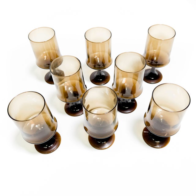 Sip in style with this mid century mod 8 piece set by Libbey Glass Company. This design was called Tawny Accent and the...