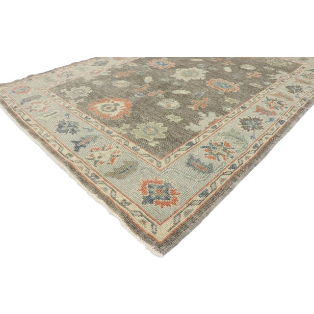Earth-Tone Turkish Oushak rug with Modern American Colonial style. Warm and inviting with effortless beauty, this hand...