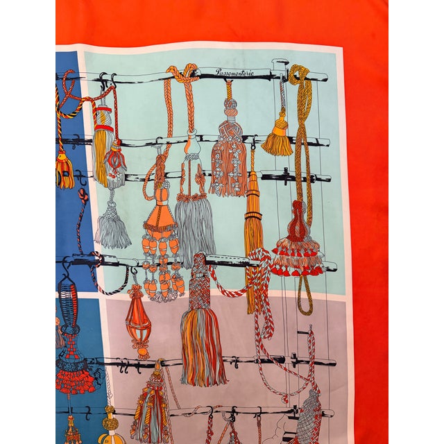Hermès Trimmings Quadri silk Scarf designed by Françoise Héron 2017 A border in Hermès' famous orange color and a gradient...