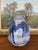 This hand-thrown studio pottery vase features a bold and expressive glaze treatment in layered tones of cobalt,...