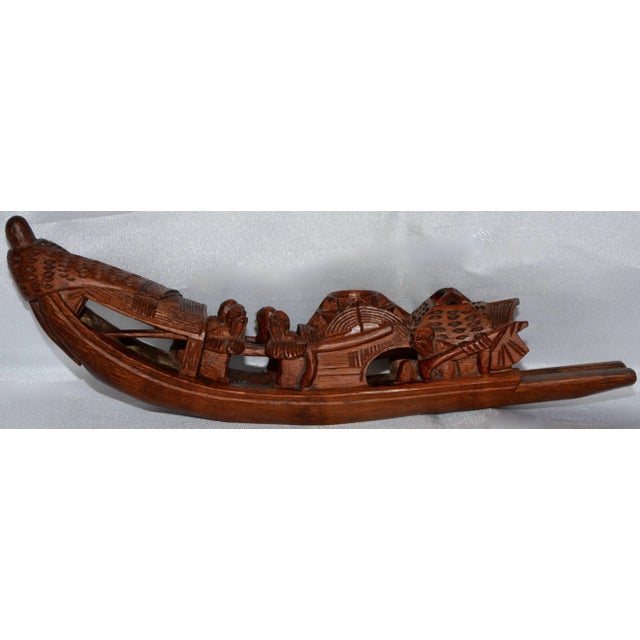 Hand-carved details are lovely on this unusual incense burner. The men are rowing the boat and appear to have a smile on...