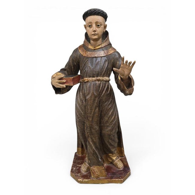 Exceptional polychrome carved wood sculpture of Saint Anthony of Padua, created in the Spanish Colonial world during the...